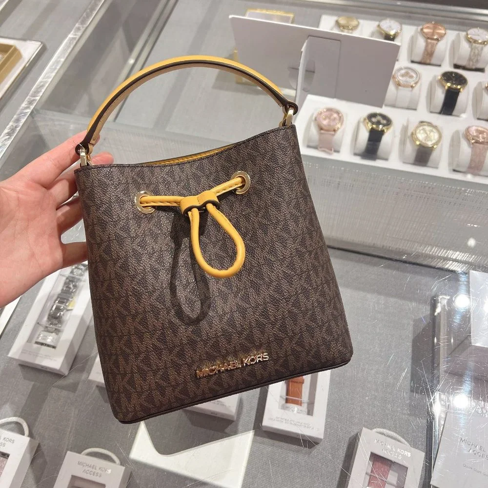 Michael Kors MK Suri Small Bucket Crossbody Drawstring Bag Brown/Marigold
